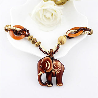 KUNIU 2023 Boho Jewelry Ethnic Style Long Hand Made Bead Wood Elephant Pendant Necklace for Women Price Decent women's neck Alodia Store