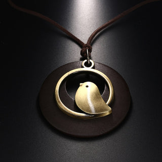 Vintage Wooden Bird Pendant Necklaces Boho Ethnic Style Metal Hollow Necklaces Retro Long Sweater Chain Rope Jewelry for Women Alodia Store