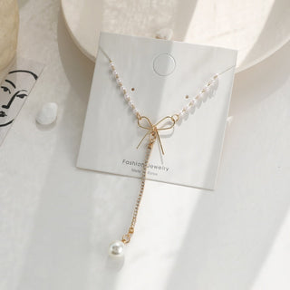 women geometry necklace, pearl asymmetry of fashionable, metal, aureate bowknot, collarbone chain necklace fashion ALODIA STORE